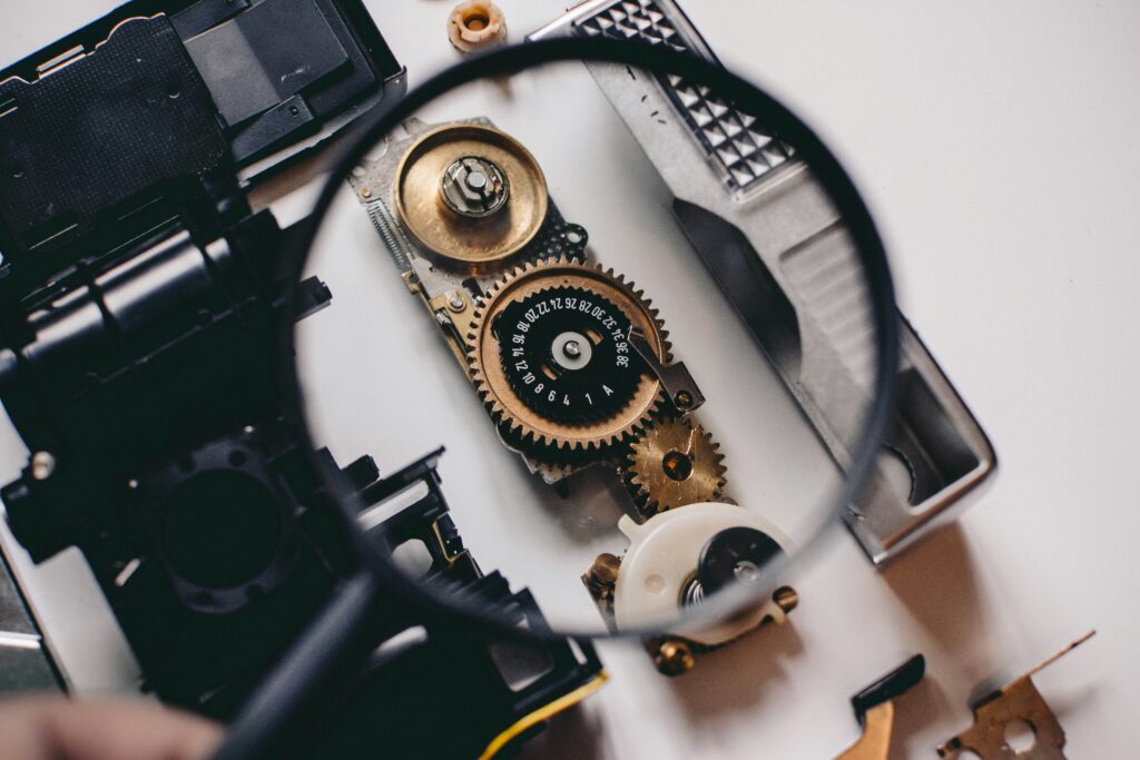 Close-up of cogs under magnification, representing diagnosing the real issues in organisations