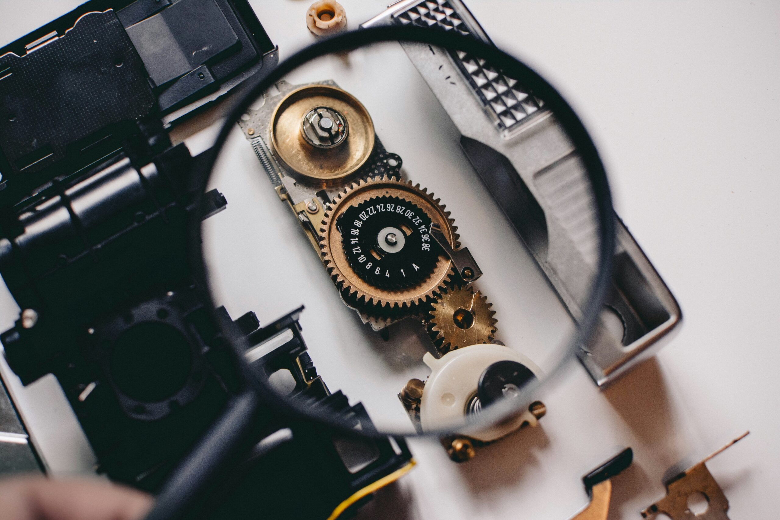 Close-up of cogs under magnification, representing diagnosing the real issues in organisations