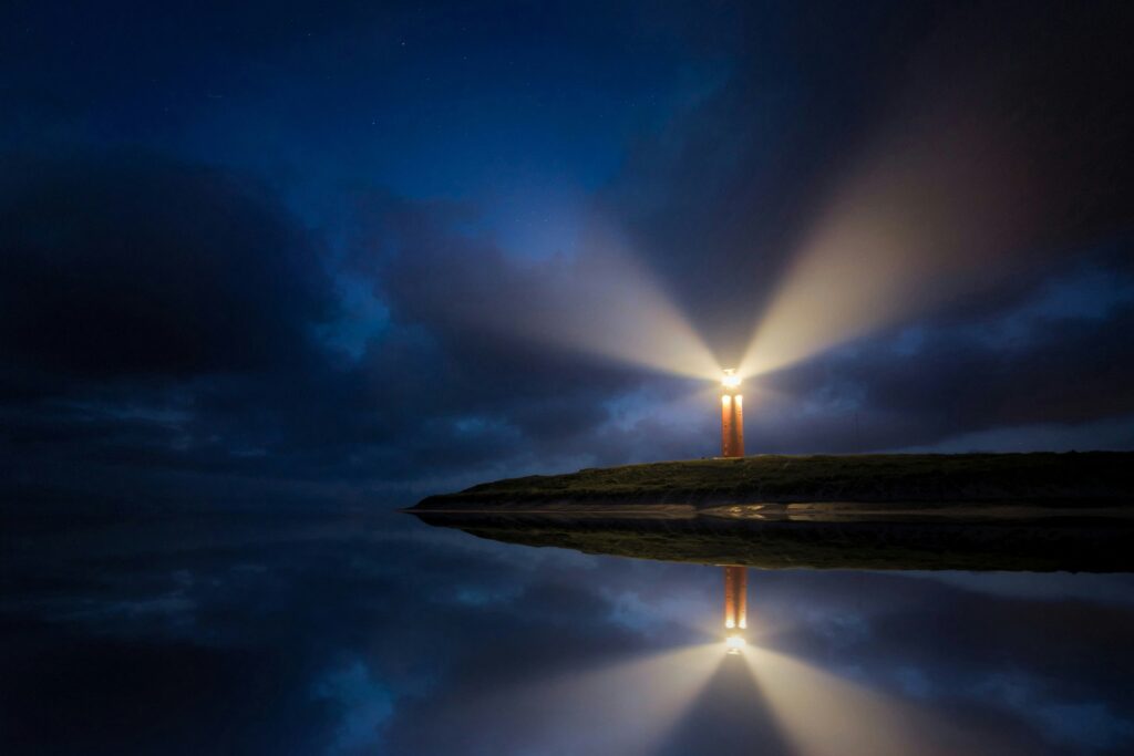 A light house in a storm symbolising clarity in organiosational turnaround
